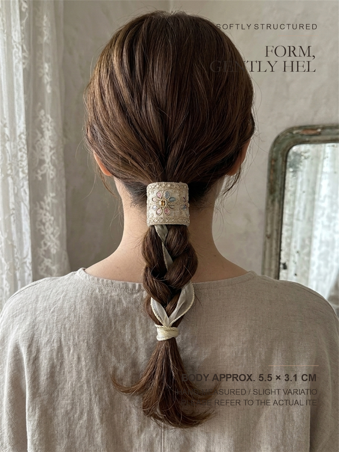 Ivory Ribbon Reverie softly structured cuff with approximate 5.5 by 3.1 centimeter body size