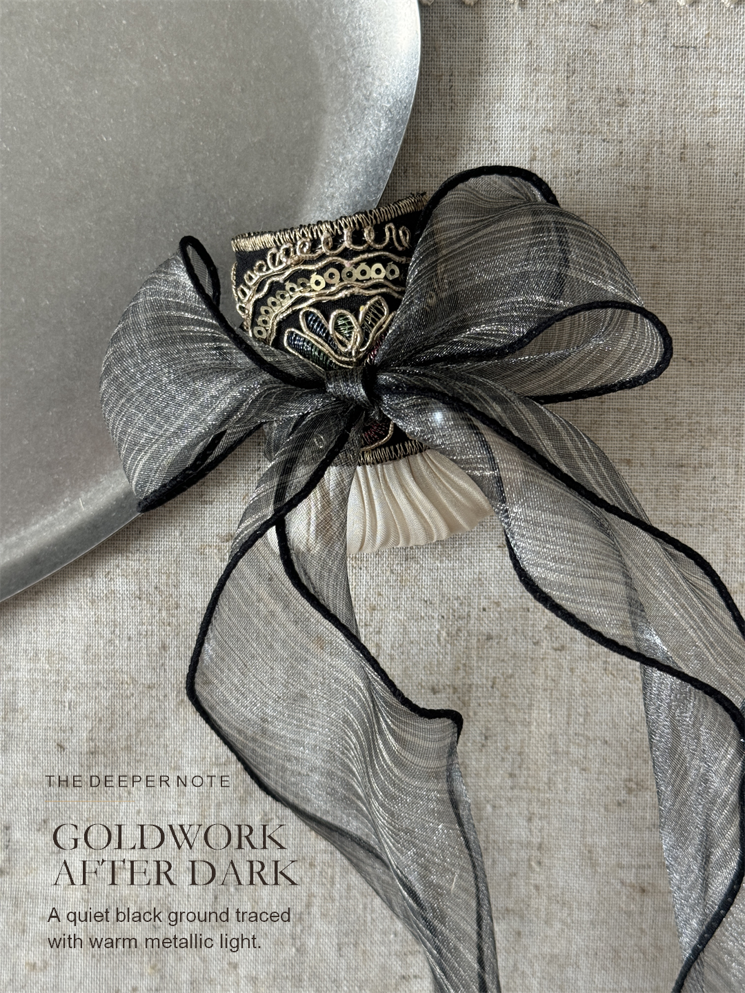 Midnight Gold Pleat color story highlighting gold embroidery on a black textile ground